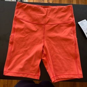 Orange Athleta Biker Shorts